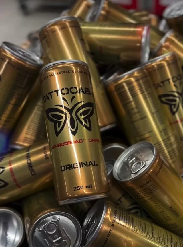 TATTOOABA gold can with neon bar background